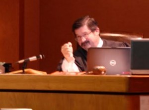 Judge Dib Waldrip makes a fist during yesterday's hearing. Photo: Mike Bennitt